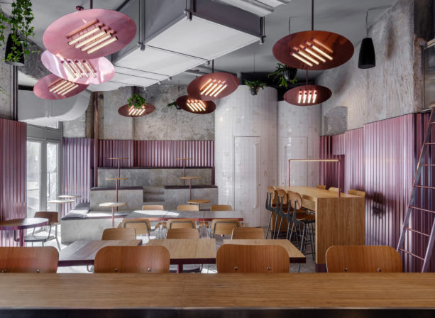 bar interior dominated with pink corrugated metal walls