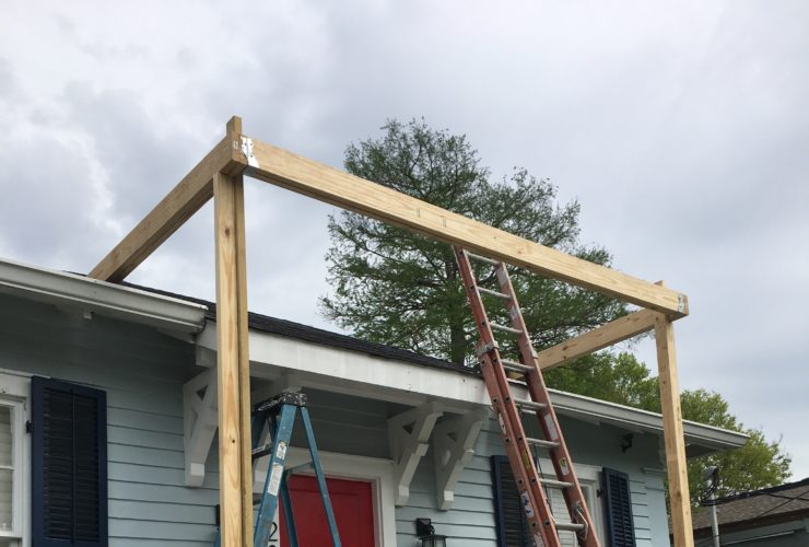 the installed top plate of a new roof for porch