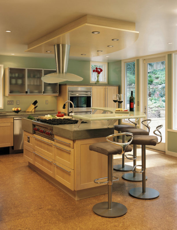 a contemporary kitchen with caramel maple cabinets and Seawashed Glass wall paint