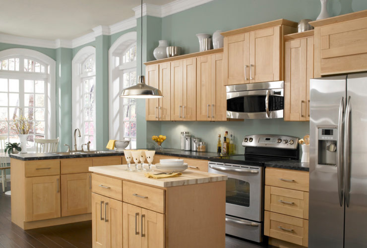 the combination between North American maple kitchen cabinets and Whyte Blue wall paint
