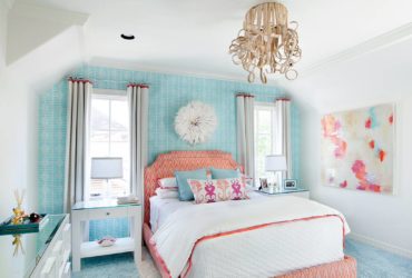 a coral and blue themed transitional bedroom with underwater feel