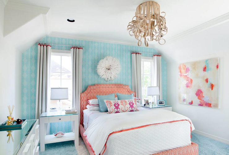 a coral and blue themed transitional bedroom with underwater feel