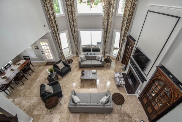 a mid-century modern living room with travertine floor