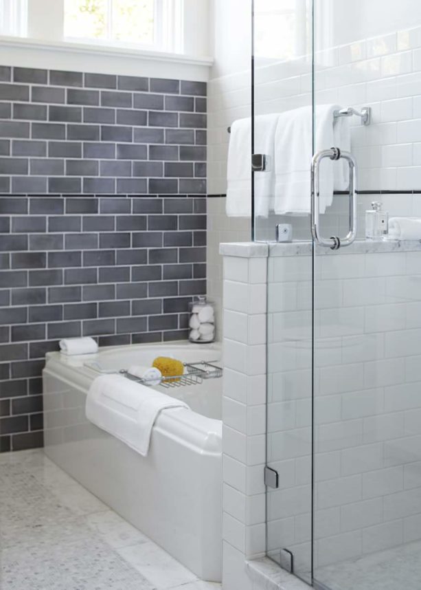 multi-color bathroom design with white subway tile and white grout
