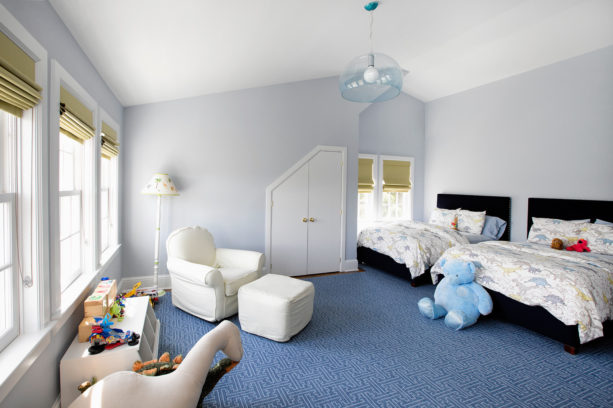 gender-neutral kids’ bedroom with grey walls and patterned Aegean blue carpet flooring