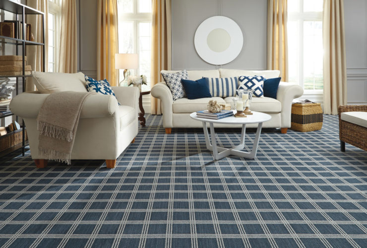 spruce blue square-patterned carpet flooring to match light grey walls in a traditional living room