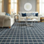 spruce blue square-patterned carpet flooring to match light grey walls in a traditional living room