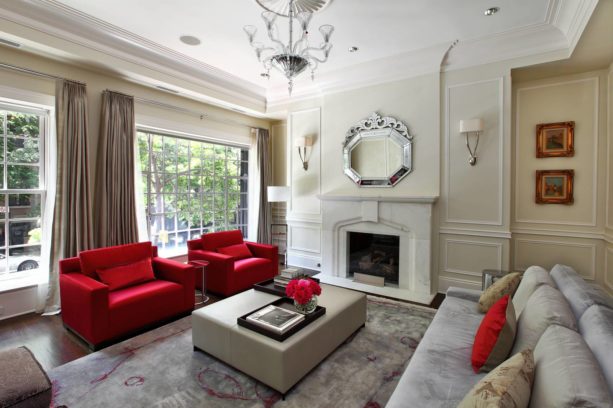 stunning red chairs in an eclectic living room with grey and beige colors