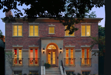 the pairing between red brick and tan accents in an attractive traditional exterior