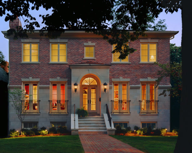 the pairing between red brick and tan accents in an attractive traditional exterior