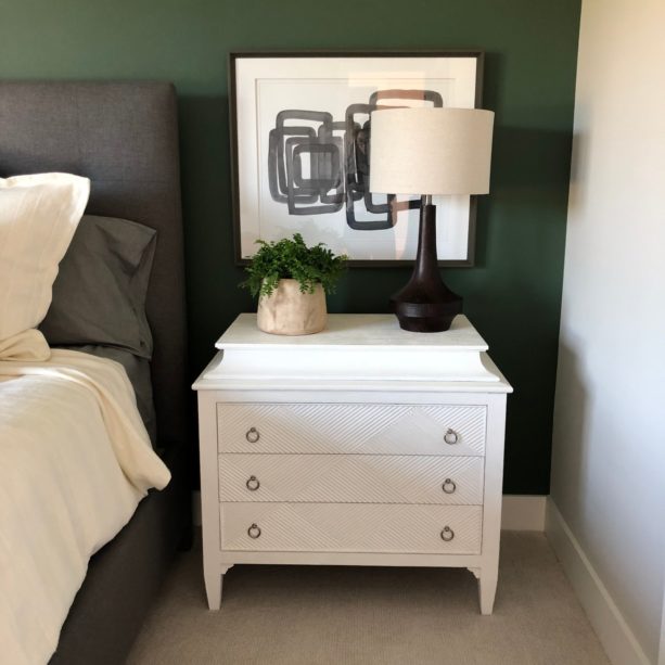 a closer look to the bed and the accent wall behind it