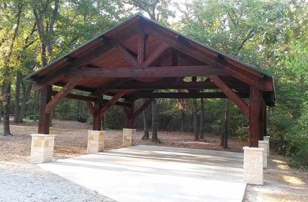 cedar post and beam carport styled as a traditional structure