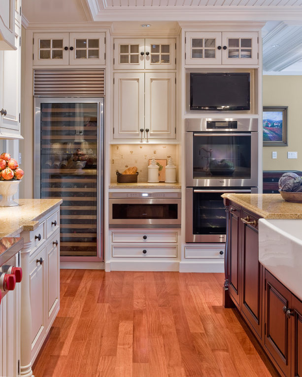 custom-colored beaded inset floor to ceiling cabinets with a brown glaze