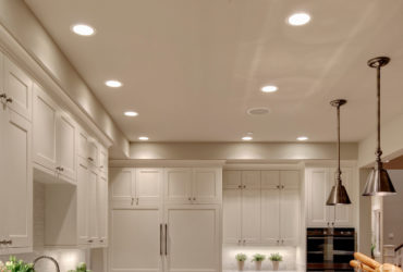 elegant white shaker floor to ceiling cabinets in benjamin moore dove white