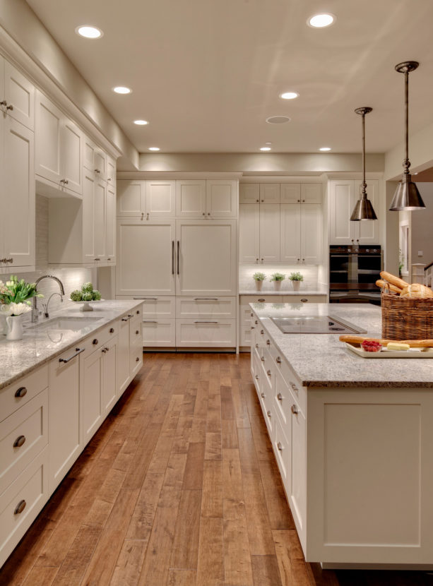 elegant white shaker floor to ceiling cabinets in benjamin moore dove white