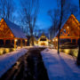 lakeside timber frame post and beam carport with natural stone base