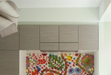 laminated fabric backsplash behind stove only in an eclectic kitchen
