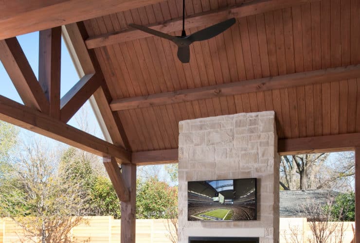 modern patio with outdoor gas fireplace and wall mounted tv