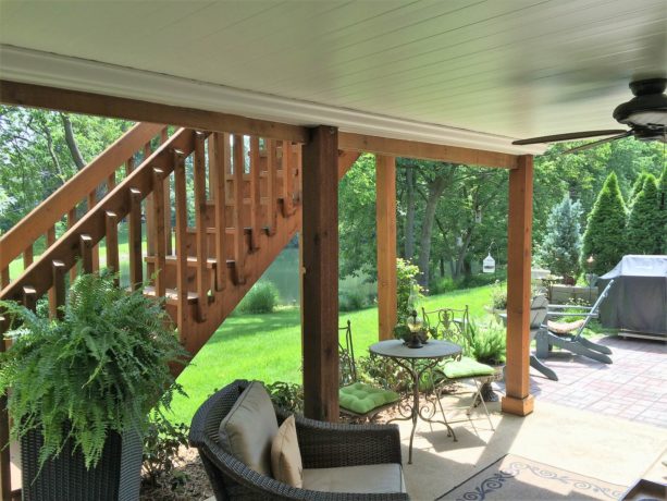 patio idea under the deck with white ceiling