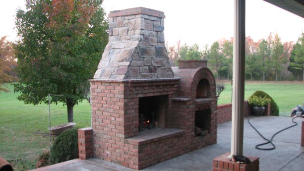 combination of outdoor fireplace and mattone barile brick pizza oven