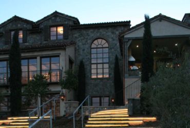 led outdoor lighting underneath the walnut travertine stair