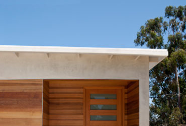entry concrete steps covered with light tone wood