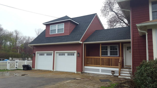 two-car garage with a small bonus room above