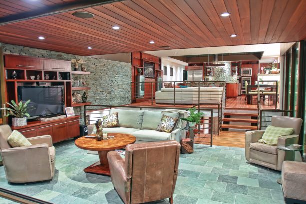 beach style house interior with an open concept living room in a split level