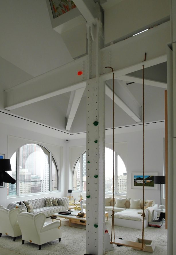 fun and decorative support beam with a swing on its side