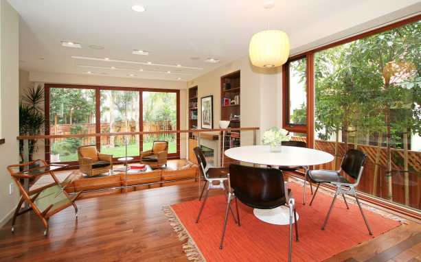 house interior of two seating spaces divided by split level