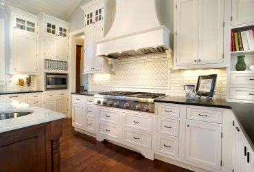 snowcap white cabinets with black glass hardware