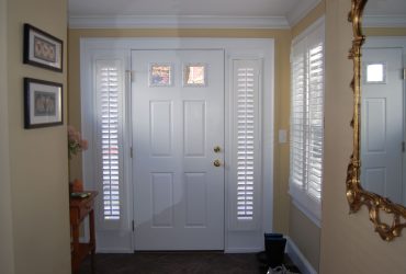 custom made plantation shutters as a window treatment for sidelight