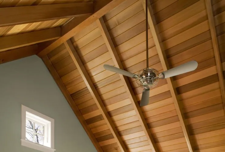 red cedar wood panels in a vaulted ceiling