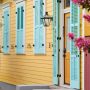 soft cyan shutter color that goes with a yellow house