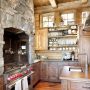 combination of reclaimed oak and natural stone element in a log cabin kitchen