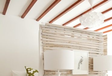 lathe panels in a beach style as a studio apartment room divider