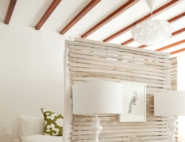 lathe panels in a beach style as a studio apartment room divider
