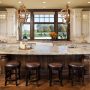 modern rustic kitchen with a combination of distressed white cabinets and wood elements