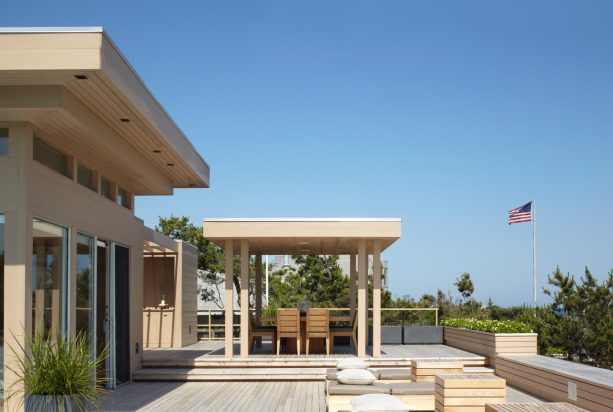 beach style floating deck with a pergola