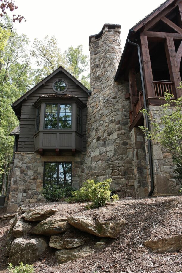 painted wood bay window exterior in a rustic home