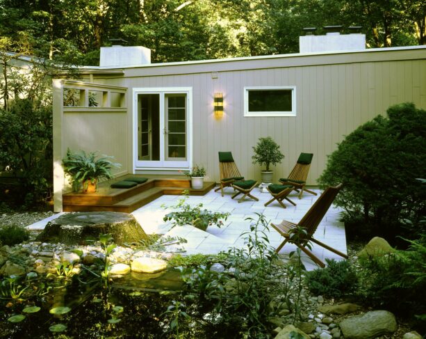 a combination of wood steps in a limestone patio