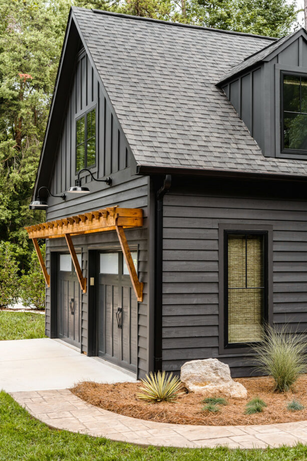 cedar pergola over the garage doors that contrast them