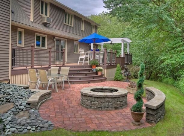 wooden steps to separate the brick patio and the deck