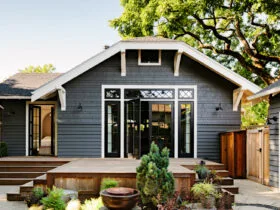 black windows and front door trim with white shaker trim