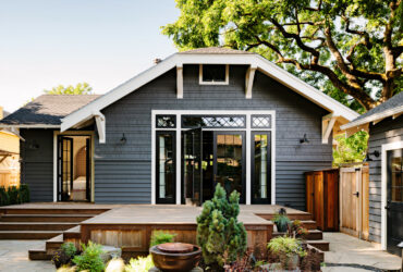 black windows and front door trim with white shaker trim