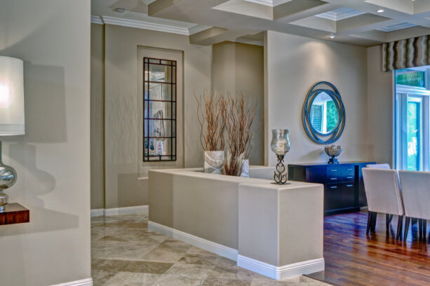 pony wall in the entry to partially enclose the living space