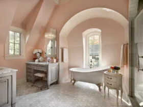 soft coral pink bathroom wall paired with gray furniture
