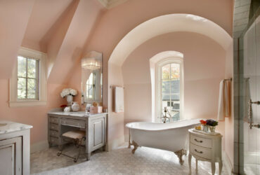 soft coral pink bathroom wall paired with gray furniture