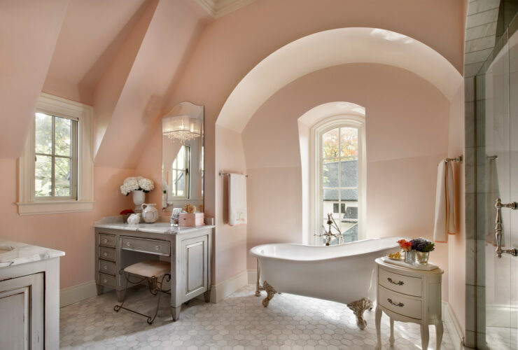 soft coral pink bathroom wall paired with gray furniture